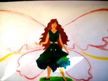 In the same room, I also painted a fairy princess on the white desk.